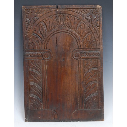 1257 - A 17th century oak panel, carved with an architectural arch, 46cm x 31cm, c.1680