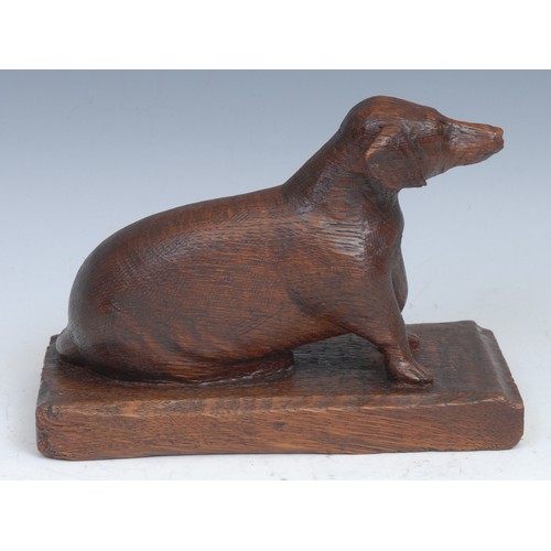 2089 - Folk Art - an oak carving, of a dachshund dog, rectangular base, 19cm wide, early 20th century