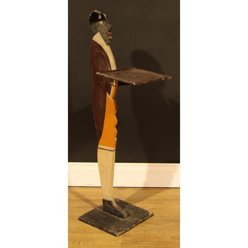 2163 - Interior Decoration - a novelty blackamoor type dummy board waiter, as a footman, he stands, holding... 