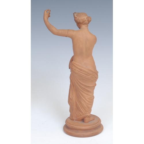 2041 - A Grand Tour terracotta figure, the Venus of Capua, after the Antique, waisted circular base, 22cm h... 