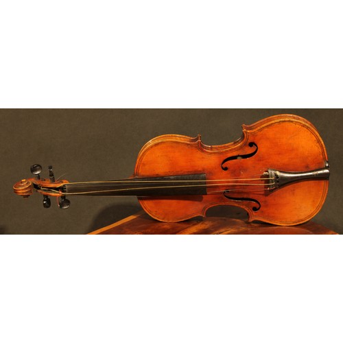 2565 - A violin, the two-piece back 36.5cm long excluding button, paper label printed Giovanni Paolo Maggin... 