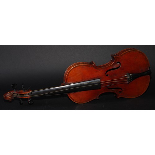 2565 - A violin, the two-piece back 36.5cm long excluding button, paper label printed Giovanni Paolo Maggin... 