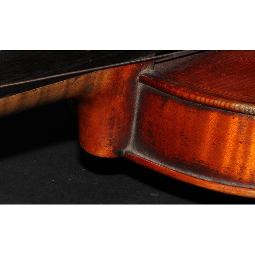 2565 - A violin, the two-piece back 36.5cm long excluding button, paper label printed Giovanni Paolo Maggin... 