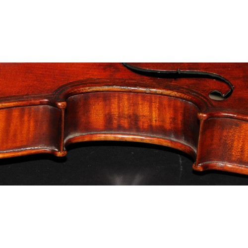 2565 - A violin, the two-piece back 36.5cm long excluding button, paper label printed Giovanni Paolo Maggin... 