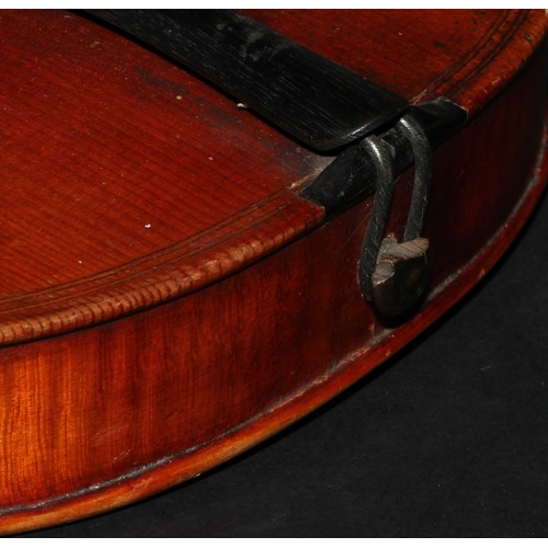 2565 - A violin, the two-piece back 36.5cm long excluding button, paper label printed Giovanni Paolo Maggin... 