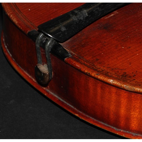 2565 - A violin, the two-piece back 36.5cm long excluding button, paper label printed Giovanni Paolo Maggin... 