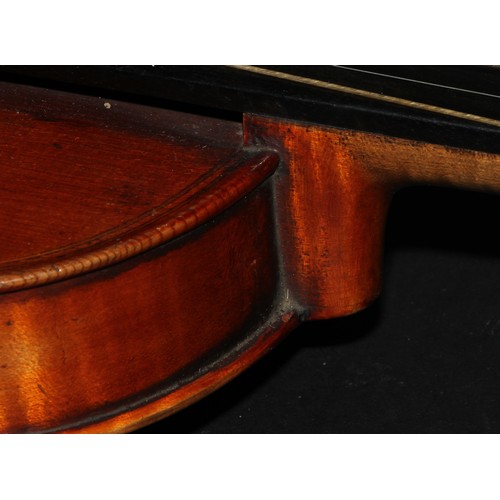 2565 - A violin, the two-piece back 36.5cm long excluding button, paper label printed Giovanni Paolo Maggin... 