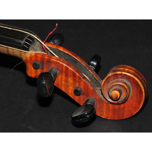 2565 - A violin, the two-piece back 36.5cm long excluding button, paper label printed Giovanni Paolo Maggin... 