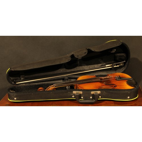 2568 - A violin, the two-piece back 36cm long excluding button, paper Stradivarius label, ebonised tuning p... 