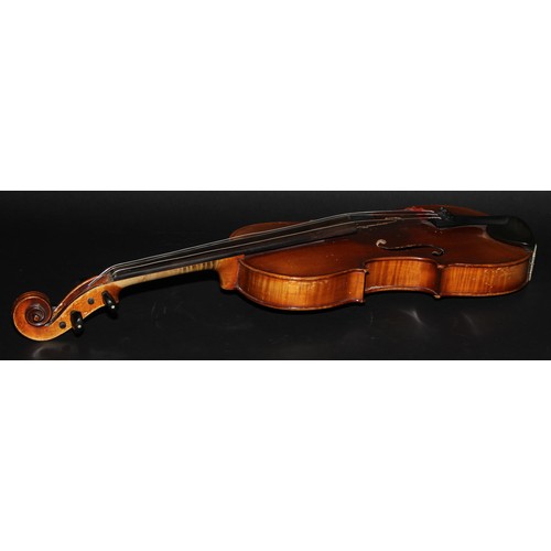 2568 - A violin, the two-piece back 36cm long excluding button, paper Stradivarius label, ebonised tuning p... 