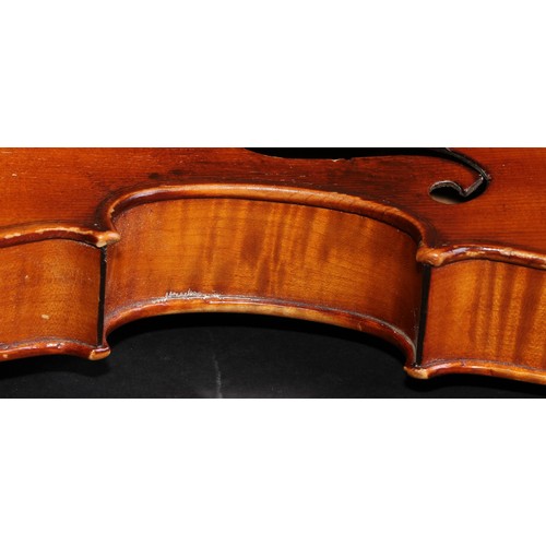 2568 - A violin, the two-piece back 36cm long excluding button, paper Stradivarius label, ebonised tuning p... 