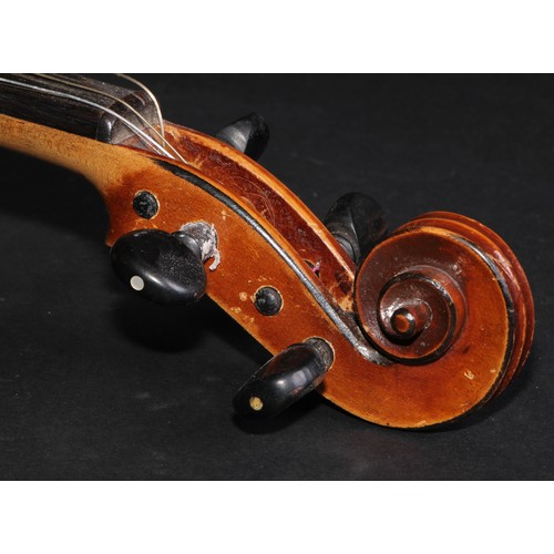 2568 - A violin, the two-piece back 36cm long excluding button, paper Stradivarius label, ebonised tuning p... 