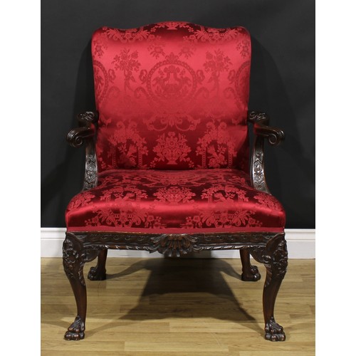 1538 - A George III Revival Gainsborough armchair, stuffed-over upholstery, outswept arms, cabriole legs, p... 