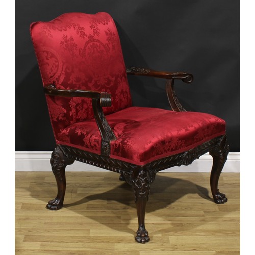 1538 - A George III Revival Gainsborough armchair, stuffed-over upholstery, outswept arms, cabriole legs, p... 