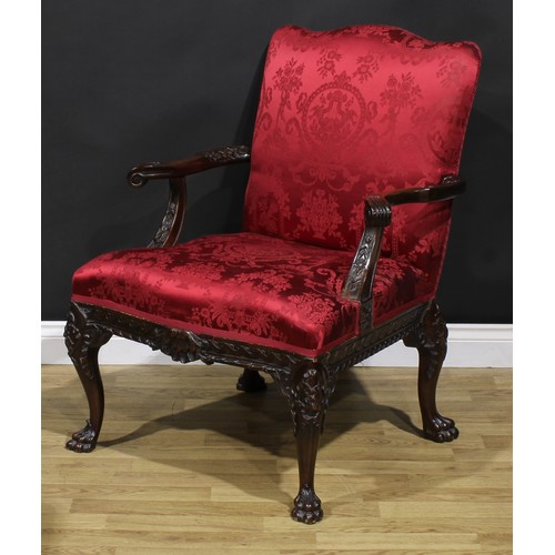 1538 - A George III Revival Gainsborough armchair, stuffed-over upholstery, outswept arms, cabriole legs, p... 