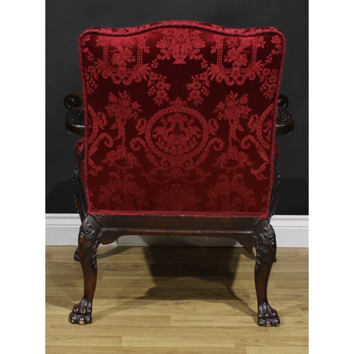 1538 - A George III Revival Gainsborough armchair, stuffed-over upholstery, outswept arms, cabriole legs, p... 