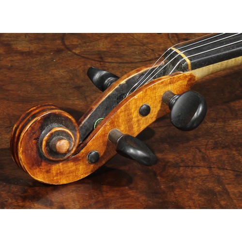 2559 - A violin, the one-piece back 35.5cm long excluding button, ebony tuning pegs, 60cm long overall, the... 