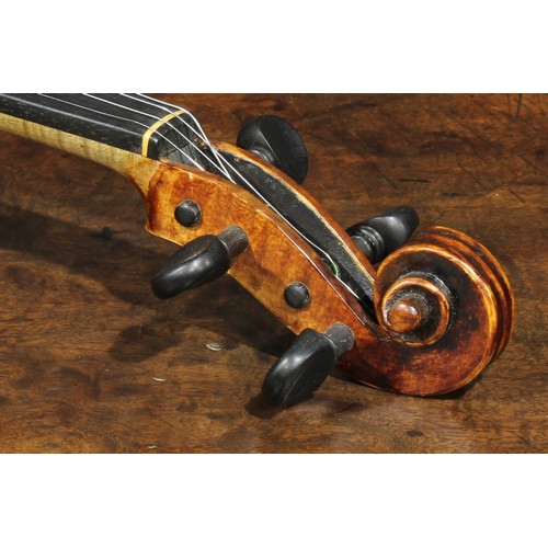 2559 - A violin, the one-piece back 35.5cm long excluding button, ebony tuning pegs, 60cm long overall, the... 