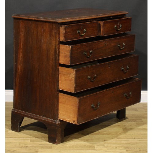 1304 - A George III mahogany chest, of two short and three long graduated drawers, brass swan neck handles,... 