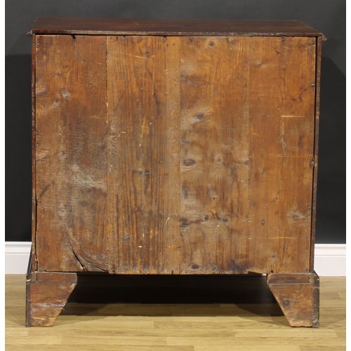 1304 - A George III mahogany chest, of two short and three long graduated drawers, brass swan neck handles,... 