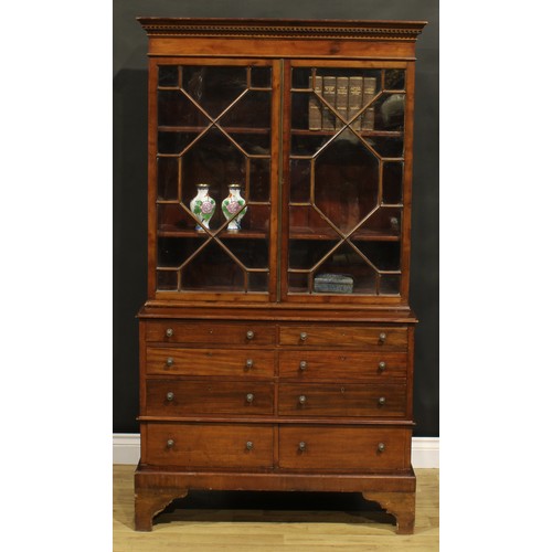 1244 - A 19th century mahogany connoisseur’s collector’s cabinet, dentil cornice above a pair of glazed doo... 