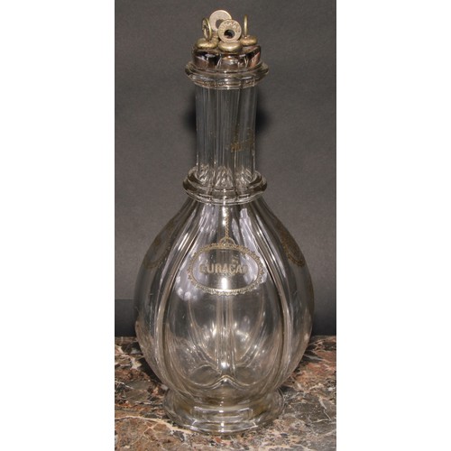 334 - An early 20th century four-section liqueur decanter, each section incised and picked out in gilt wit... 