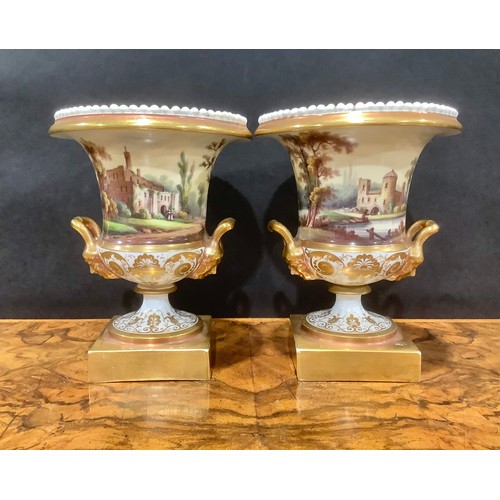 140 - A pair of 19th century porcelain campana vases, each painted with Italianate views, beaded rim, gild... 