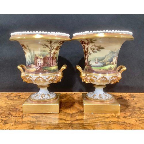 140 - A pair of 19th century porcelain campana vases, each painted with Italianate views, beaded rim, gild... 