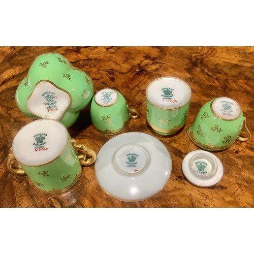 171 - A Coalport miniature tea service, comprising teapot, coffee pot, cream jug, sugar bowl, tea cup and ... 