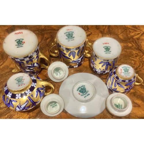170 - A Coalport miniature tea service, comprising teapot, coffee pot, cream jug, sugar bowl, tea cup and ... 