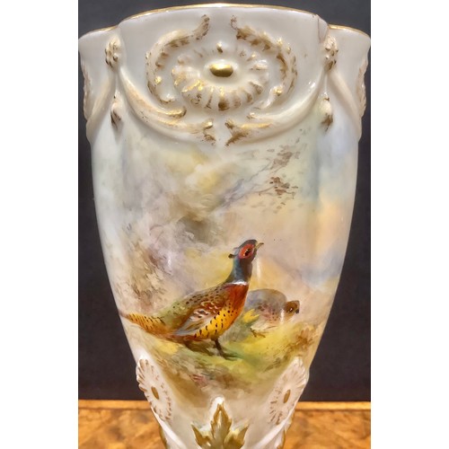 191 - A Royal Worcester lobed goblet shaped vase, painted by Jas. Stinton, signed, with pheasants on mossy... 