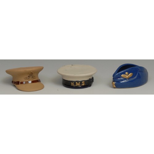 63 - Denby - a set of three ashtrays, as Navy, Army and Royal Air Force hats (3)