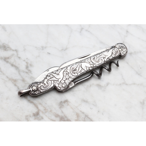 830 - Helixophilia and Machirology - a Victorian silver multi-tool pocket knife and corkscrew, chased with... 