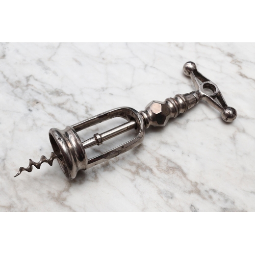 2411 - Helixophilia - a 19th century French nickel plated mechanical corkscrew, pierced handle terminating ... 