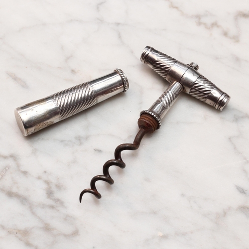 2501 - Helixophilia - an early 19th century silver coloured metal T-type travelling pocket corkscrew, screw... 