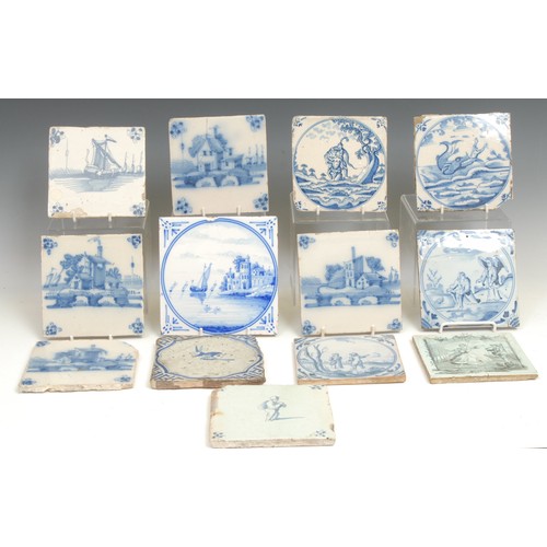 94 - A collection of 18th century Delft tiles, various subjects, Jonah and the Whale, a hare, a transfer ... 