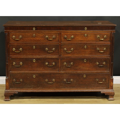 1664 - A George III mahogany banded oak Lancashire chest, hinged top above four blind, two short and one lo... 