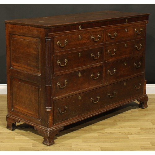 1664 - A George III mahogany banded oak Lancashire chest, hinged top above four blind, two short and one lo... 