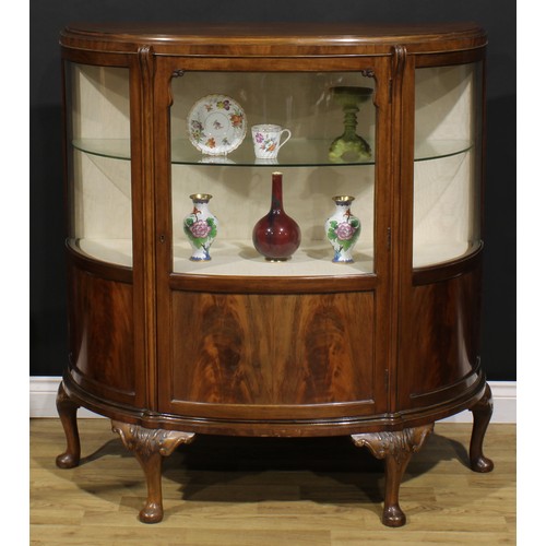 2068 - A George II Revival walnut demi-lune side cabinet, moulded top above a glazed door and rectangular p... 