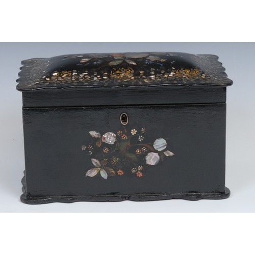 1489 - A Victorian papier mache shaped rectangular tea caddy. hinged cover enclosing a pair of lidded compa... 