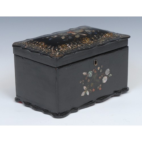 1489 - A Victorian papier mache shaped rectangular tea caddy. hinged cover enclosing a pair of lidded compa... 