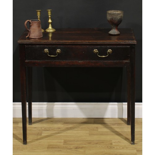 1535 - A George III oak side table, rectangular top with reeded edge above a long frieze drawer, brass swan... 