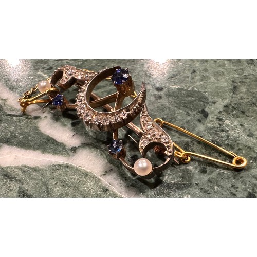 890 - A diamond, sapphire and seed pearl Art Deco Crescent brooch, set with three blue round cut sapphires... 