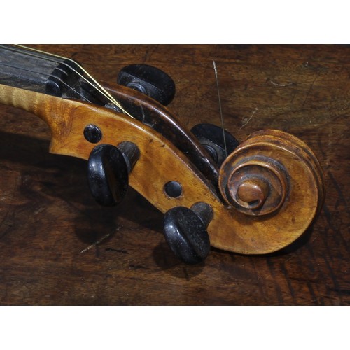 2564 - A violin, the two-piece back 35.75cm long excluding button, rosewood tuning pegs, outlined throughou... 