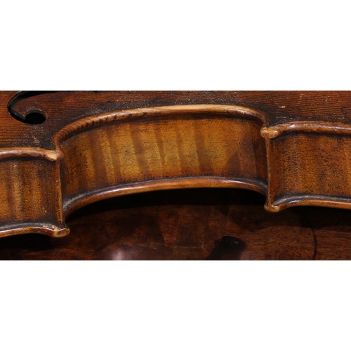 2563 - A violin, the two-piece back 35.75cm long excluding button, outlined throughout with purfling, 60cm ... 