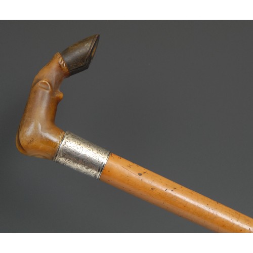 2218 - A Victorian silver mounted novelty walking stick, the horn handle carved as a horse hoof and fetlock... 