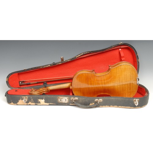 2552 - A violin, the two-piece back 36cm long excluding button, ebony tuning pegs, outlined throughout with... 