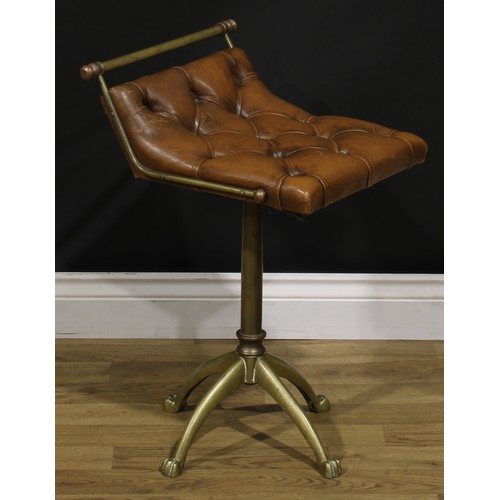 1288 - A 19th century brass adjustable music stool, deep-buttoned tan leather seat, cast paw feet, 63cm hig... 