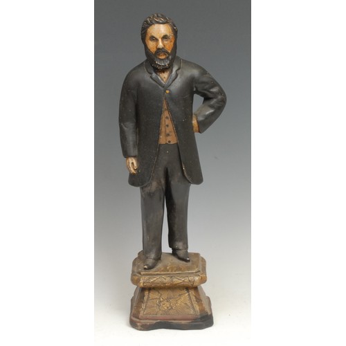 1735 - A 19th century plaster figure, of a statesman, he stands upon a faux marble plinth, 40cm high, impre... 