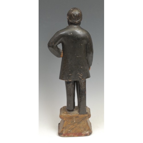 1735 - A 19th century plaster figure, of a statesman, he stands upon a faux marble plinth, 40cm high, impre... 